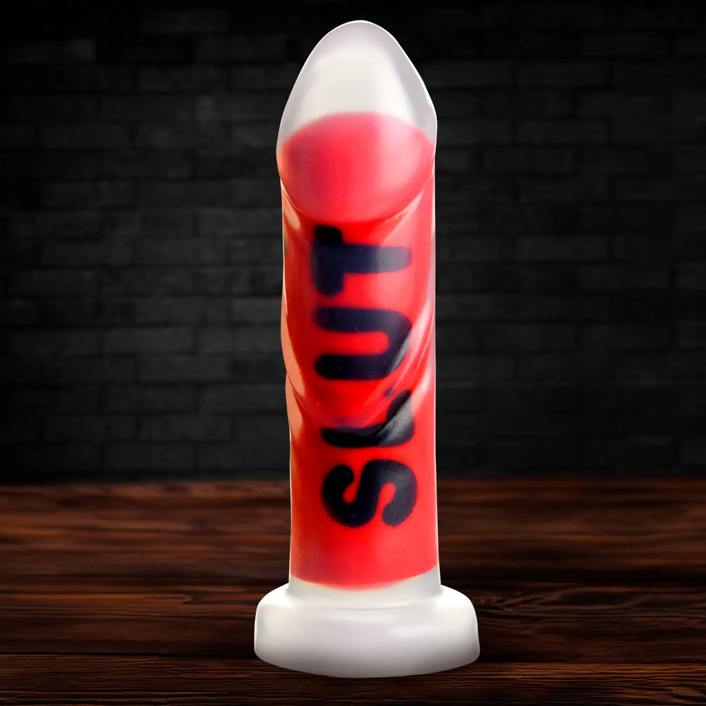 Master Series The Explicit Text dildo, a red silicone shaft with black "SLUT" lettering on a white base.