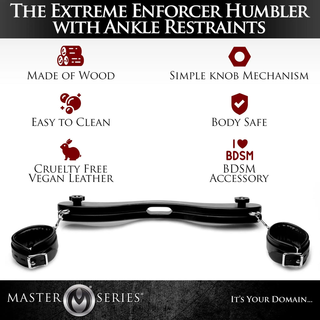 Master Series Extreme Enforcer Humbler featuring a black wooden spreader bar with attached vegan leather ankle cuffs.