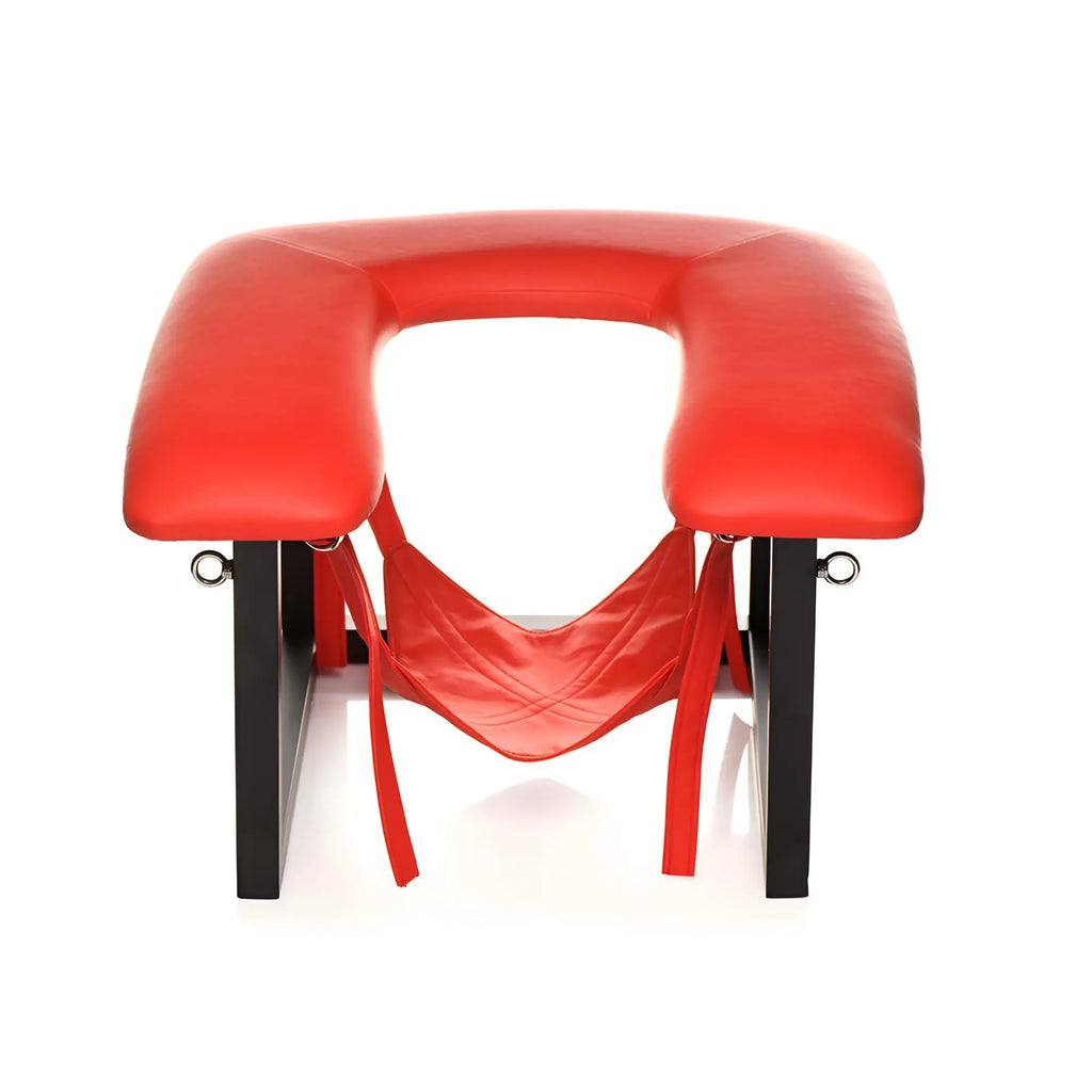 Master Series Face Rider Rimming Chair: U-shaped red padded seat on a black frame with an adjustable red sling.