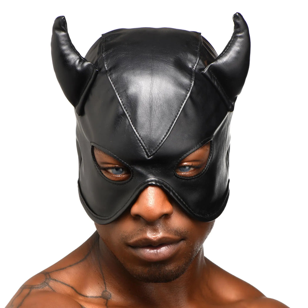 Black Master Series Fetish Hood with devil horns, worn by a man against a white background.