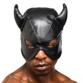 Black Master Series Fetish Hood with devil horns, worn by a man against a white background.
