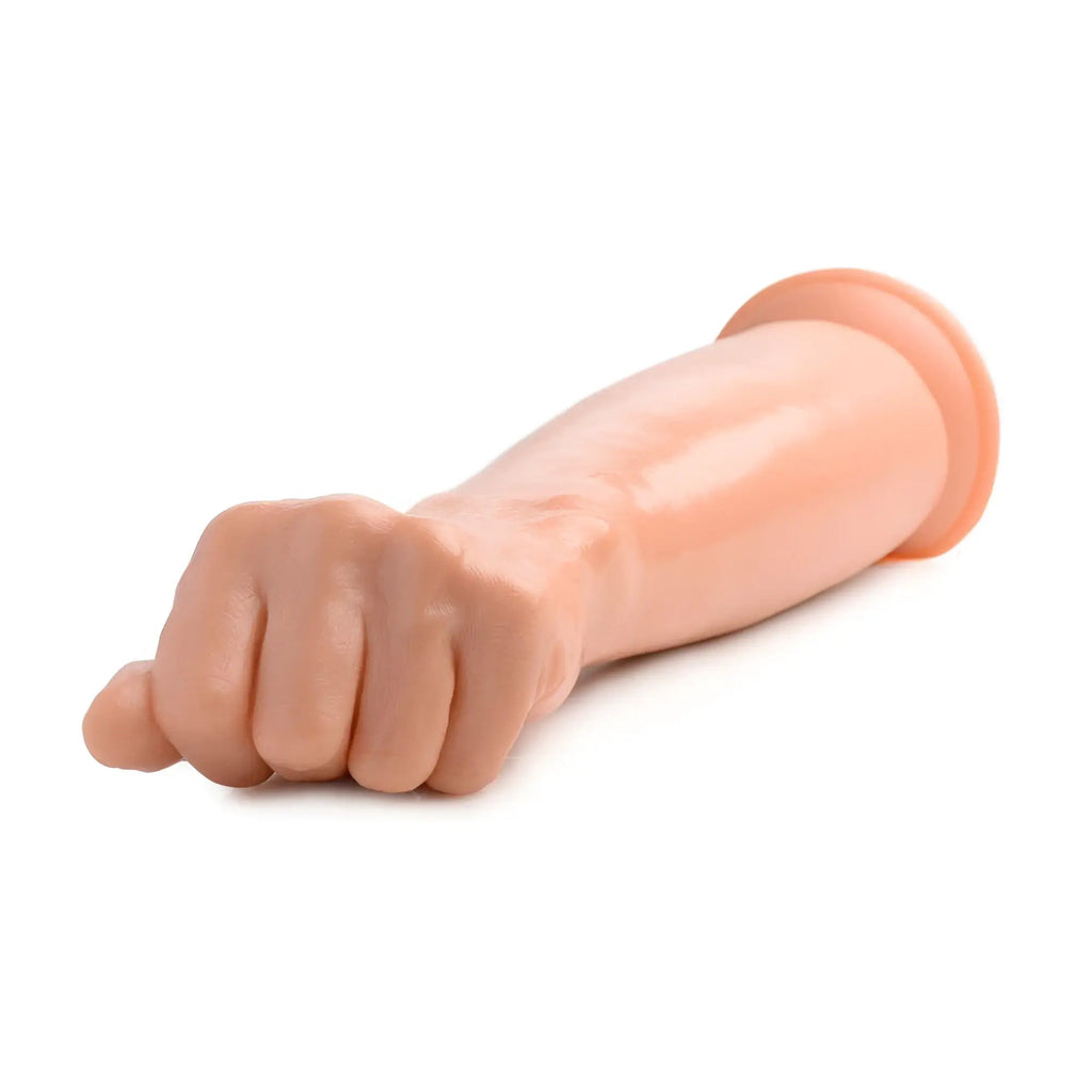 Master Series Fisto clenched fist dildo in a realistic, smooth-textured light skin tone.