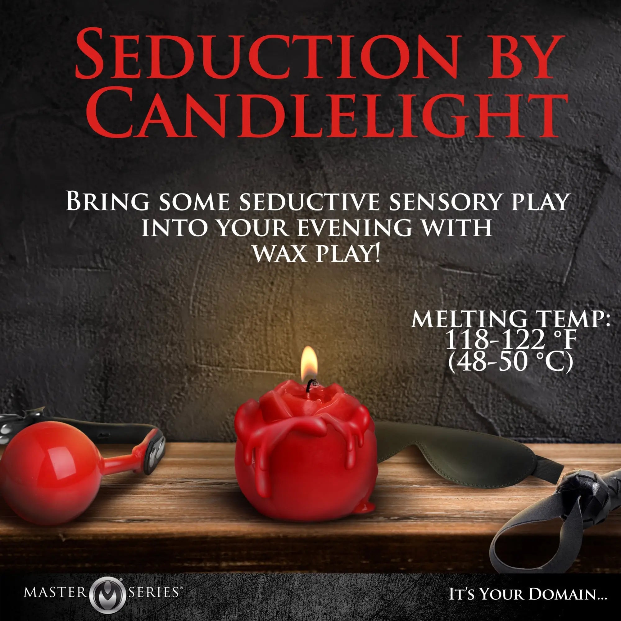 Master Series Flaming Rose Drip Candle: a red, rose-shaped melting candle on a wooden table with adult sensory gear.