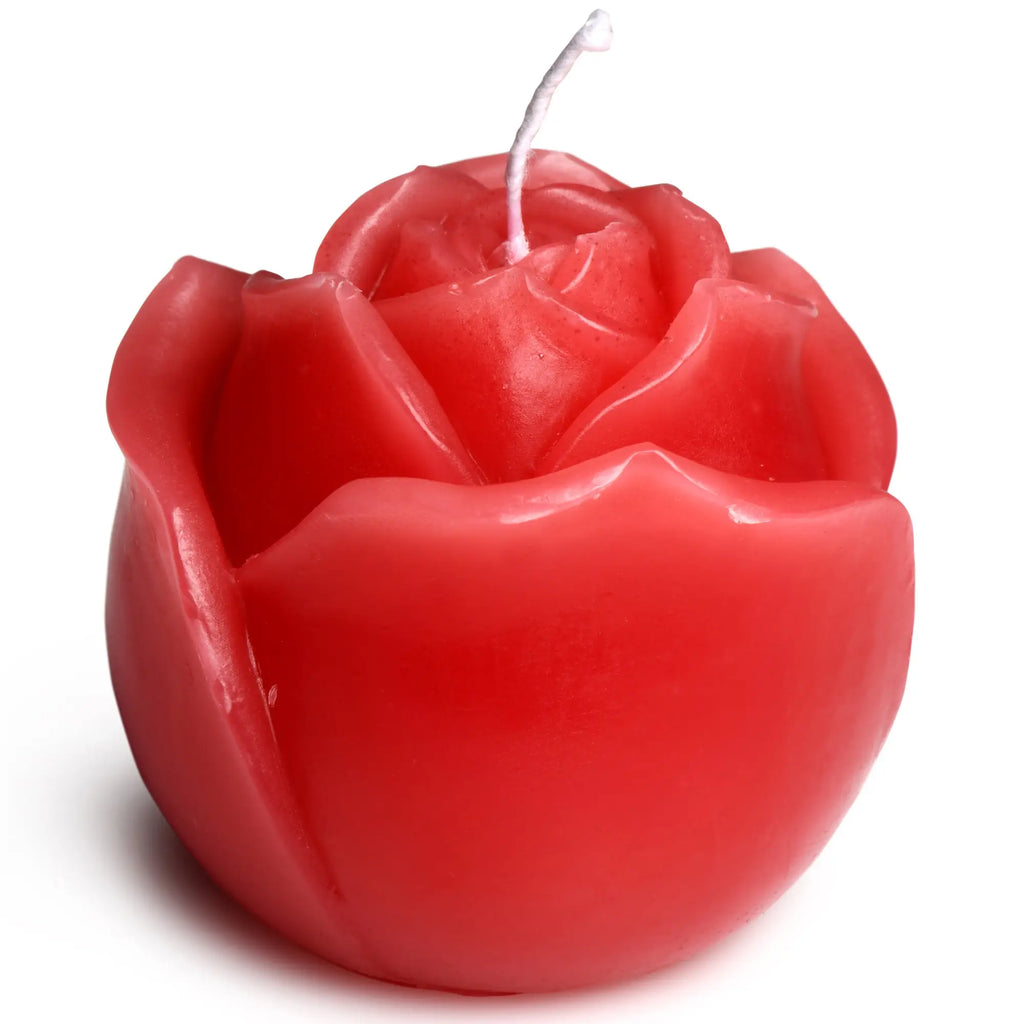 Master Series Flaming Rose Drip Candle: A smooth, vibrant red wax candle shaped like a detailed, blooming rose.