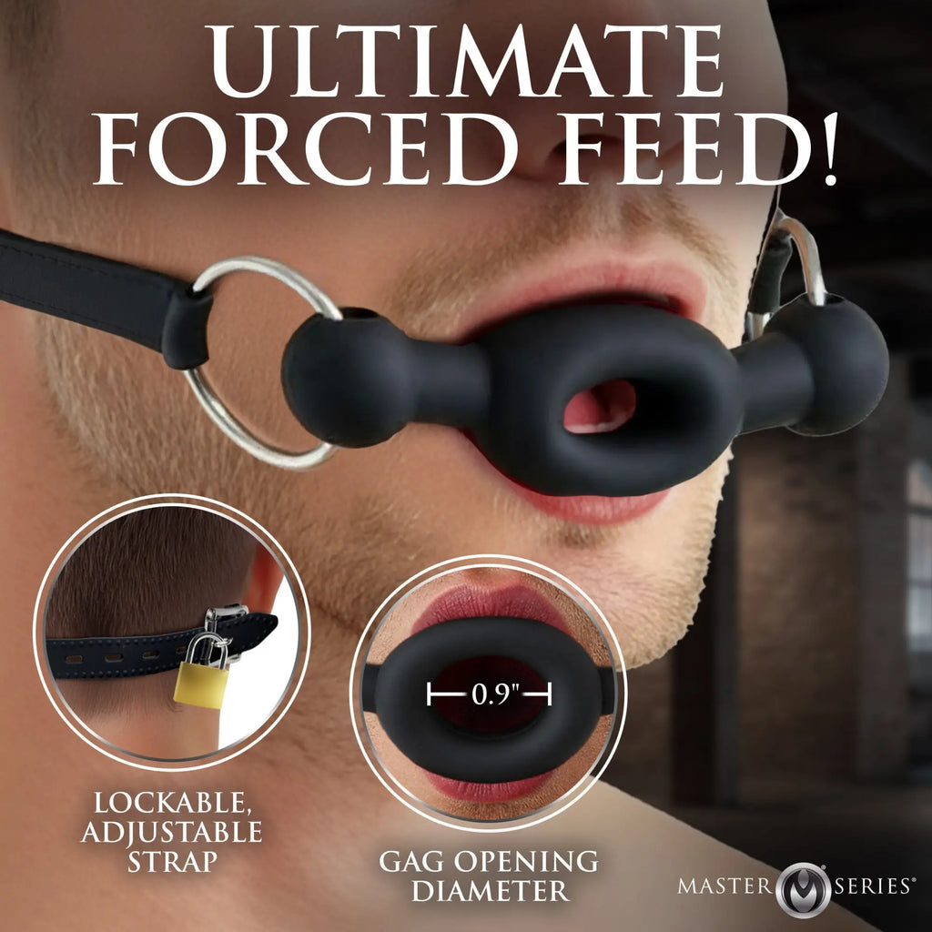 Master Series black silicone forced feeding gag with a lockable, adjustable strap, shown with a 0.9-inch opening.