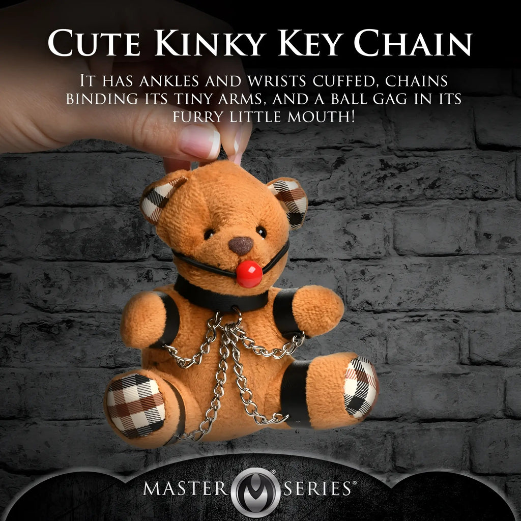 Master Series Gagged Teddy Bear keychain: brown plush bear with plaid accents, black leather cuffs, chains, and ball gag.