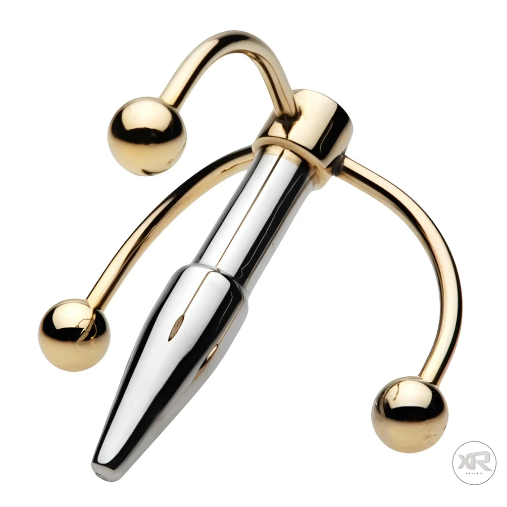 Master Series Golden Claw Urethral Plug: A silver tapered insert with three curved, golden ball-tipped arms.