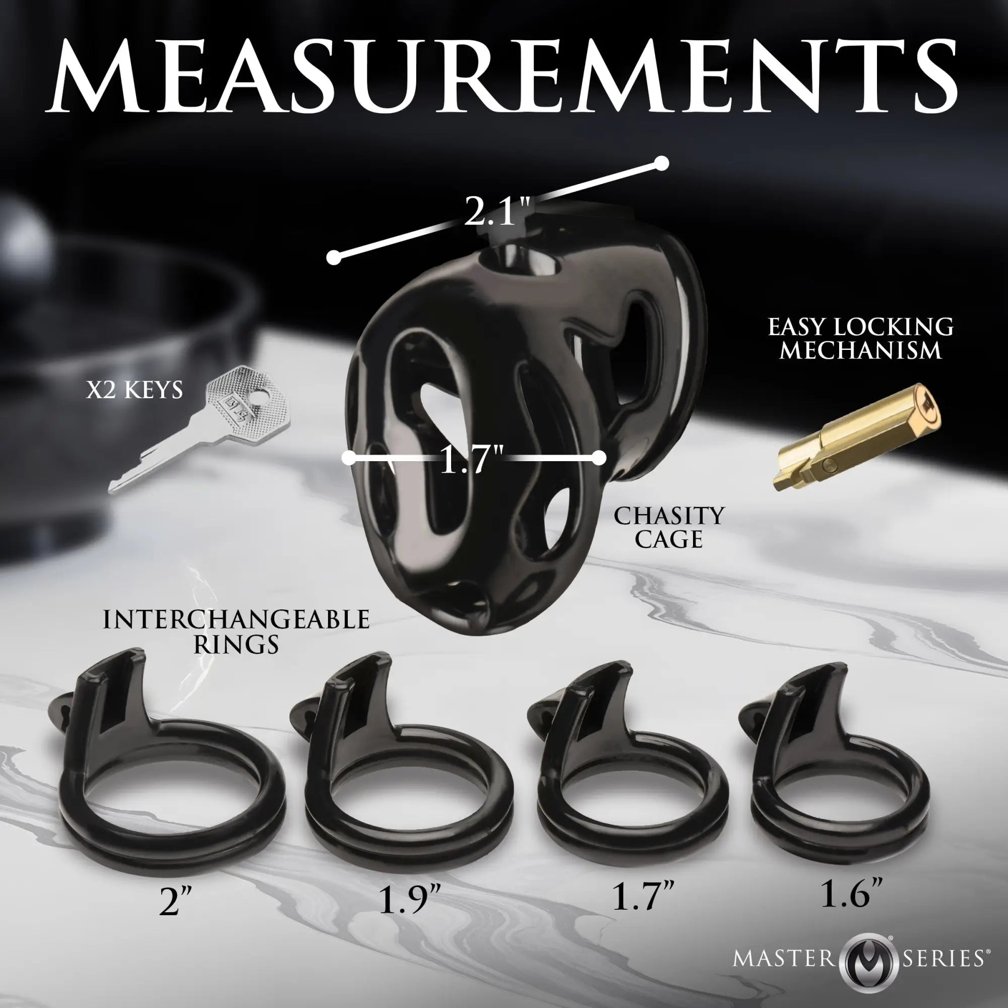Master Series Hard Stop Chastity Cage with a black cage, brass lock, keys, and four sized rings on a marble surface.