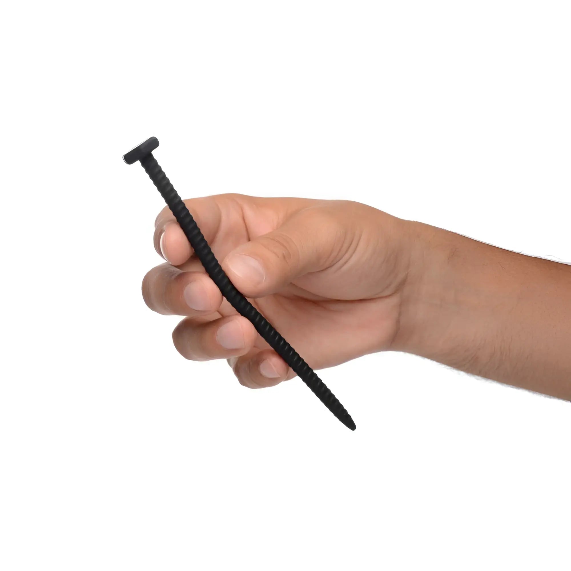 A hand holds a black Master Series Hardware silicone nail, featuring a textured, screw-like design.