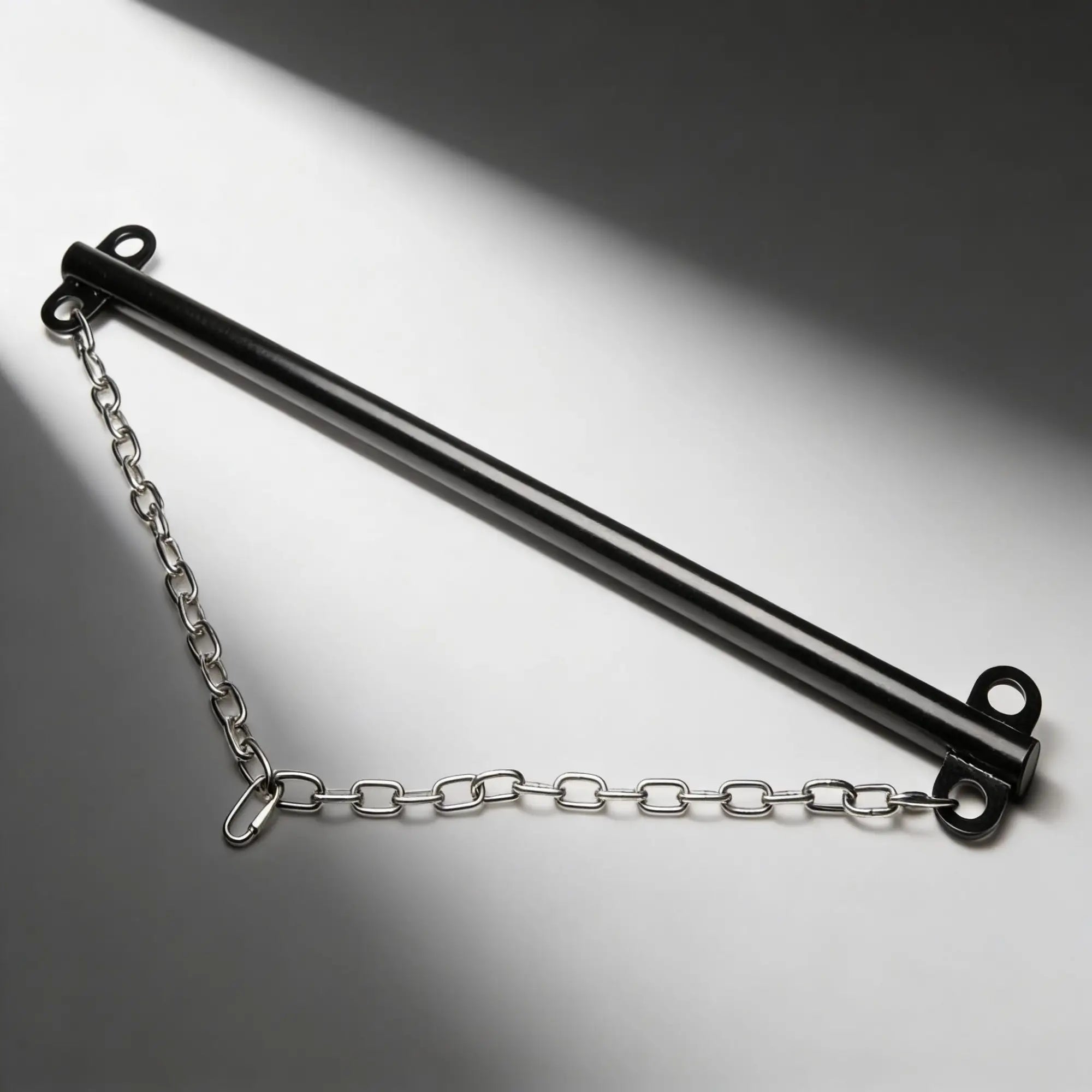Master Series heavy-duty steel bar with a black finish and attached silver-colored metal suspension chain.