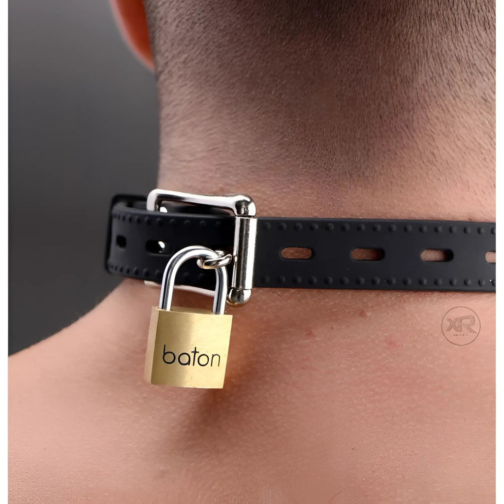Master Series Hinder black silicone collar secured around a neck with a gold-toned metal padlock.