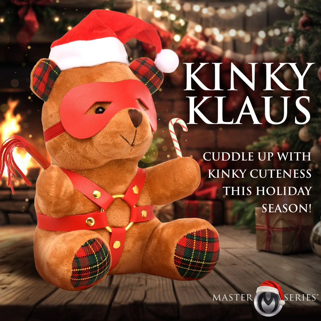 Master Series Holiday Bondage Bear wearing a Santa hat, red leather mask, chest harness, and carrying a tiny whip.