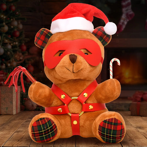 Master Series Holiday Bondage Bear wearing a Santa hat, red eye mask, and harness, holding a whip and candy cane.