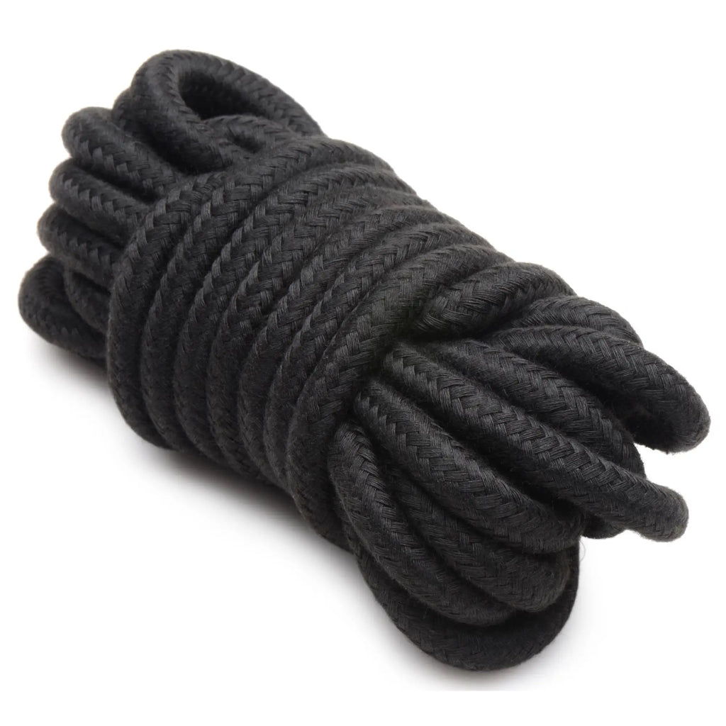 Master Series Hook Up 10-Piece Plush Bondage Set: A coil of thick, black braided rope on a plain white background.