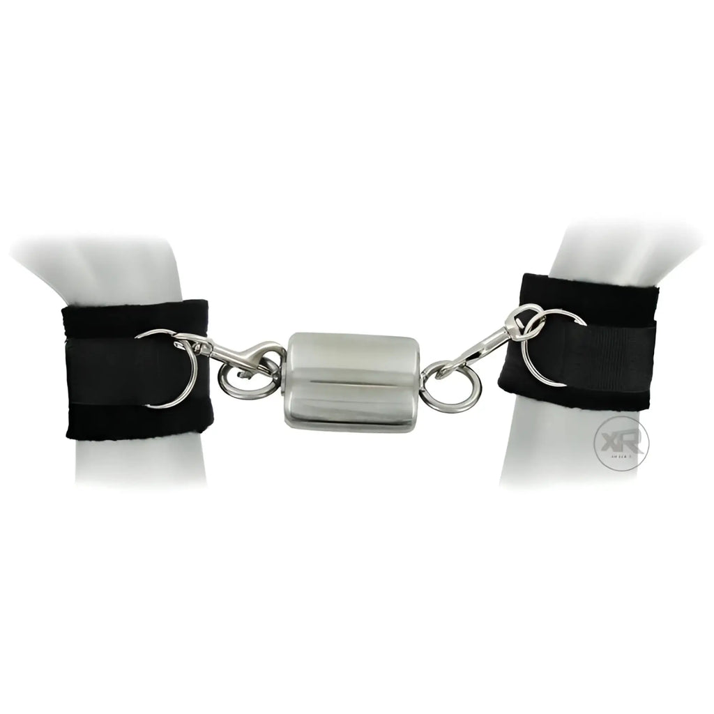 Master Series Ice Warden time lock connects two black padded wrist cuffs with a central silver metal locking device.