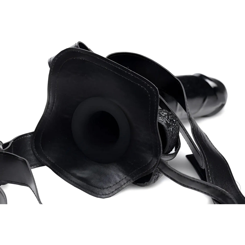 Master Series Infiltrator II: Black hollow strap-on with 9-inch dildo and adjustable leather harness on white background.