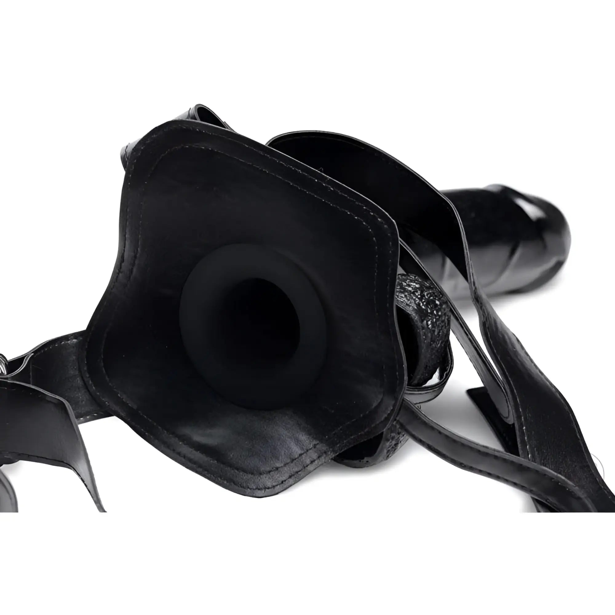 Master Series Infiltrator II: Black hollow strap-on with 9-inch dildo and adjustable leather harness on white background.