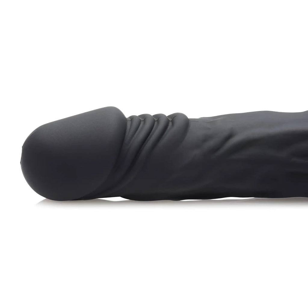 Master Series black silicone lubricant launcher dildo with a realistic, textured shaft and defined head.