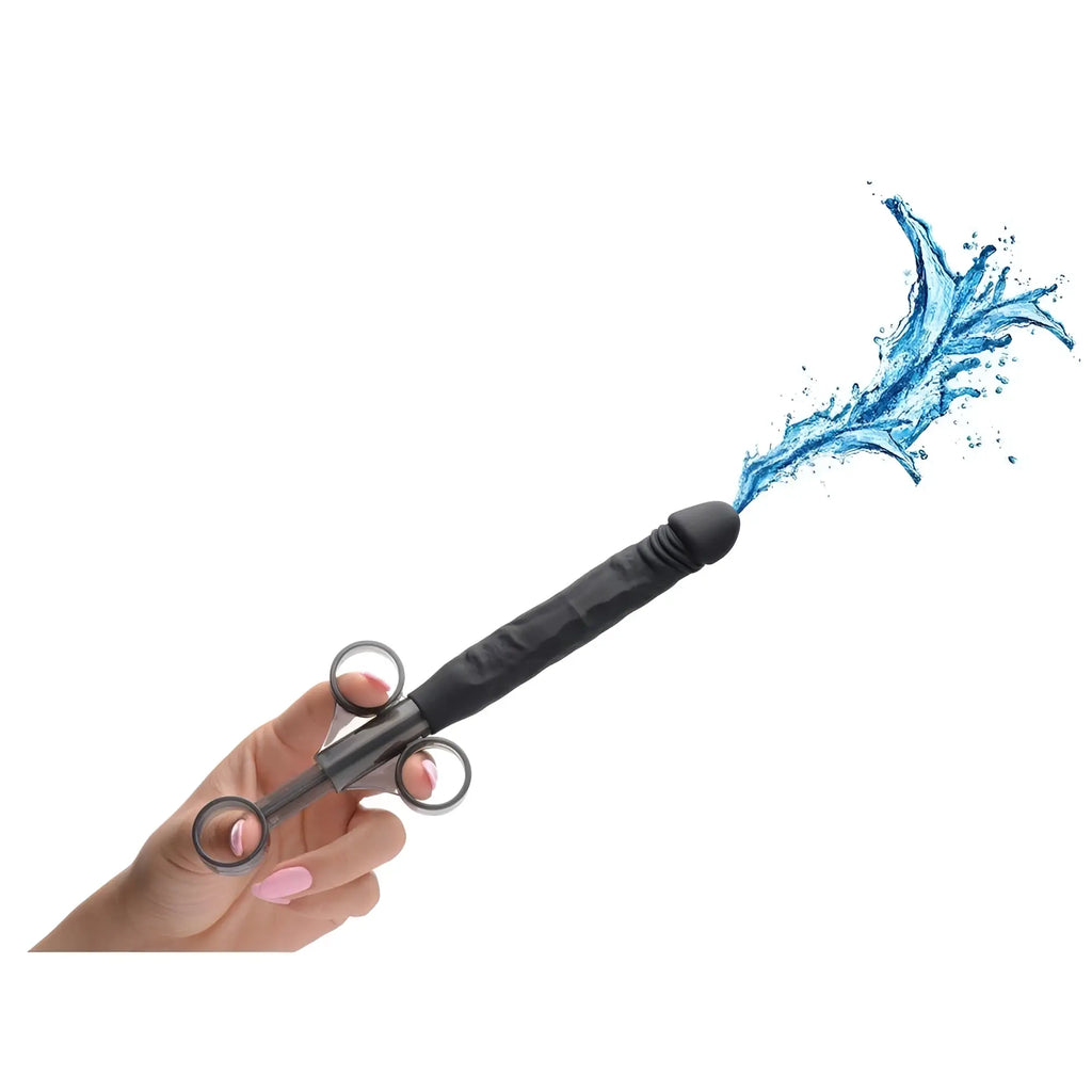 Master Series Jizz Shooter: A black silicone dildo lubricant launcher with a syringe-style grip spraying blue liquid.