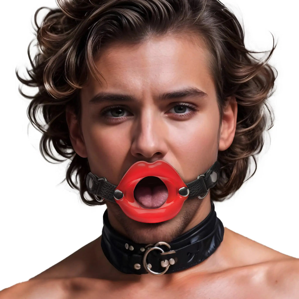 Master Series Juicy Lips Silicone Open Mouth Gag: Person wearing a red, glossy lip-shaped gag with a black leather strap.