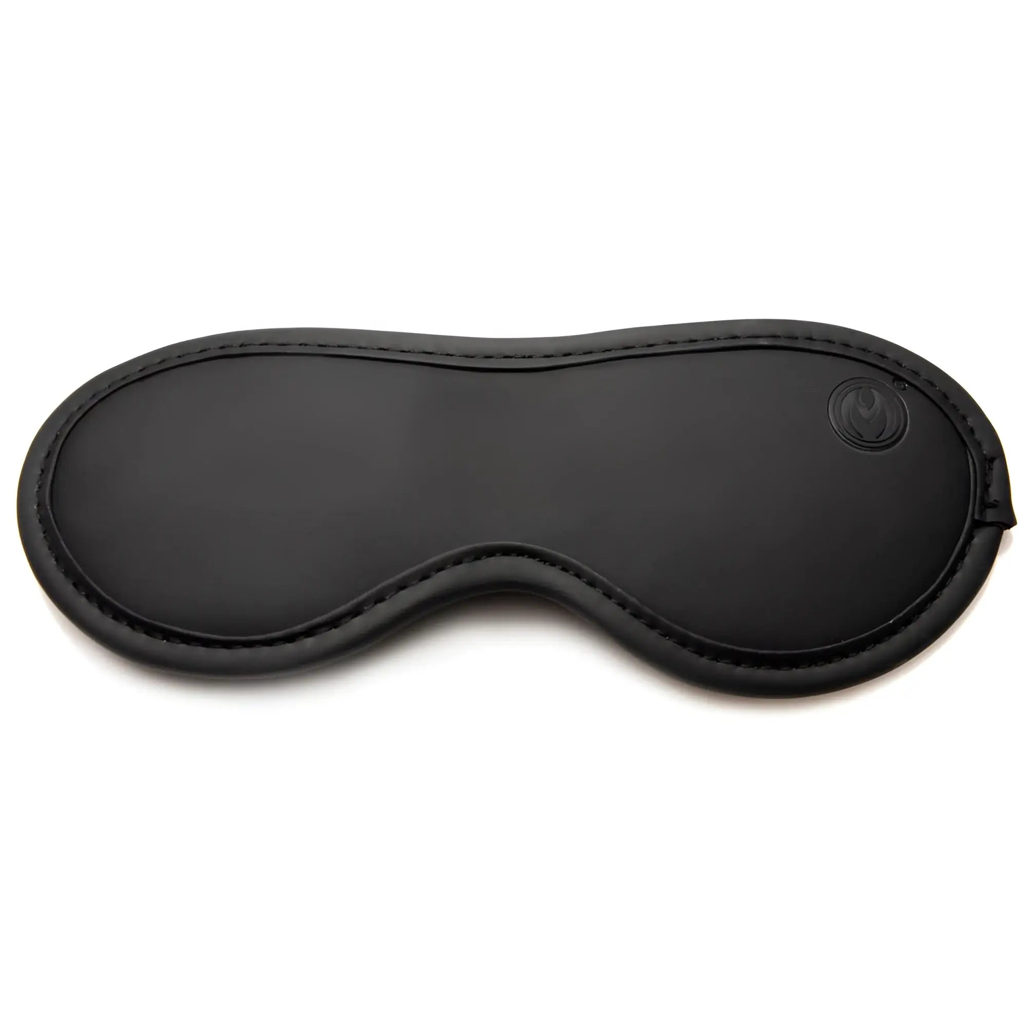 Master Series Master of Kink blindfold: A smooth, black padded eye mask with stitched edges and a small logo.