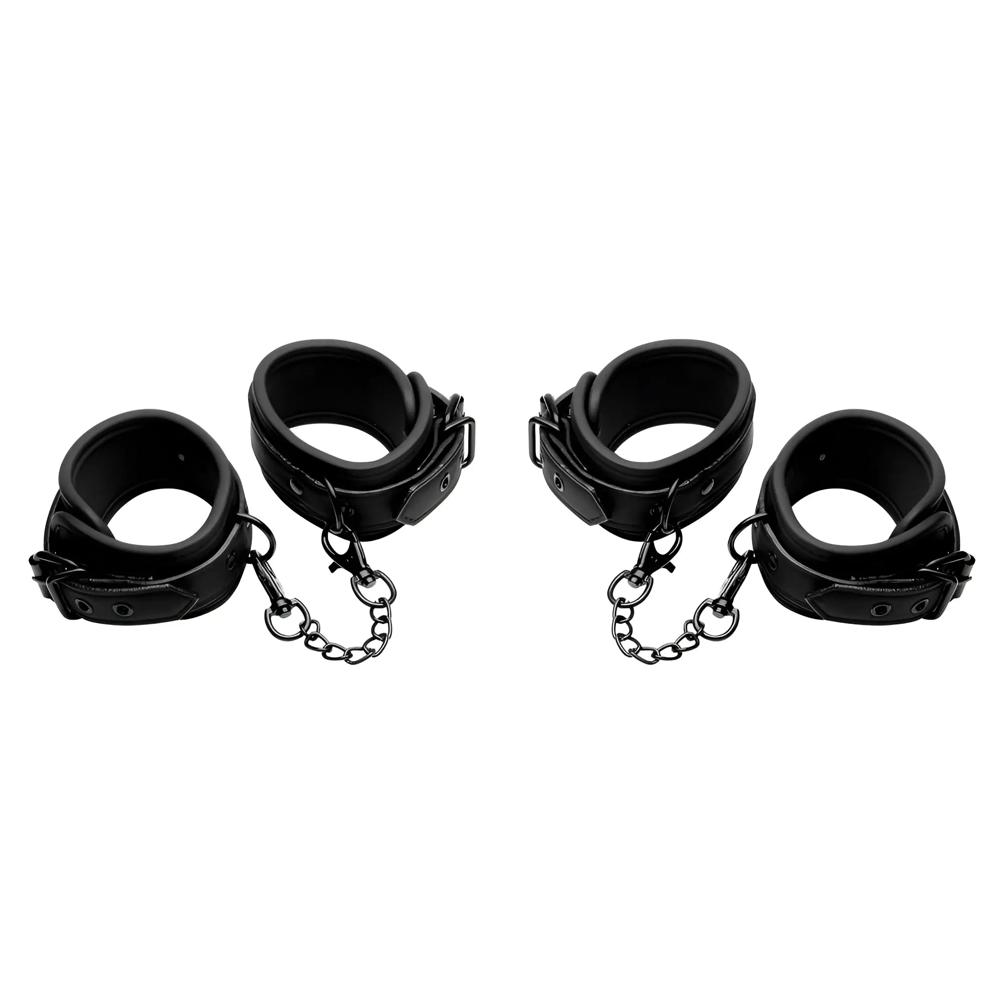 Master Series Kinky Comfort set: four black padded wrist and ankle cuffs connected by short metal chains.