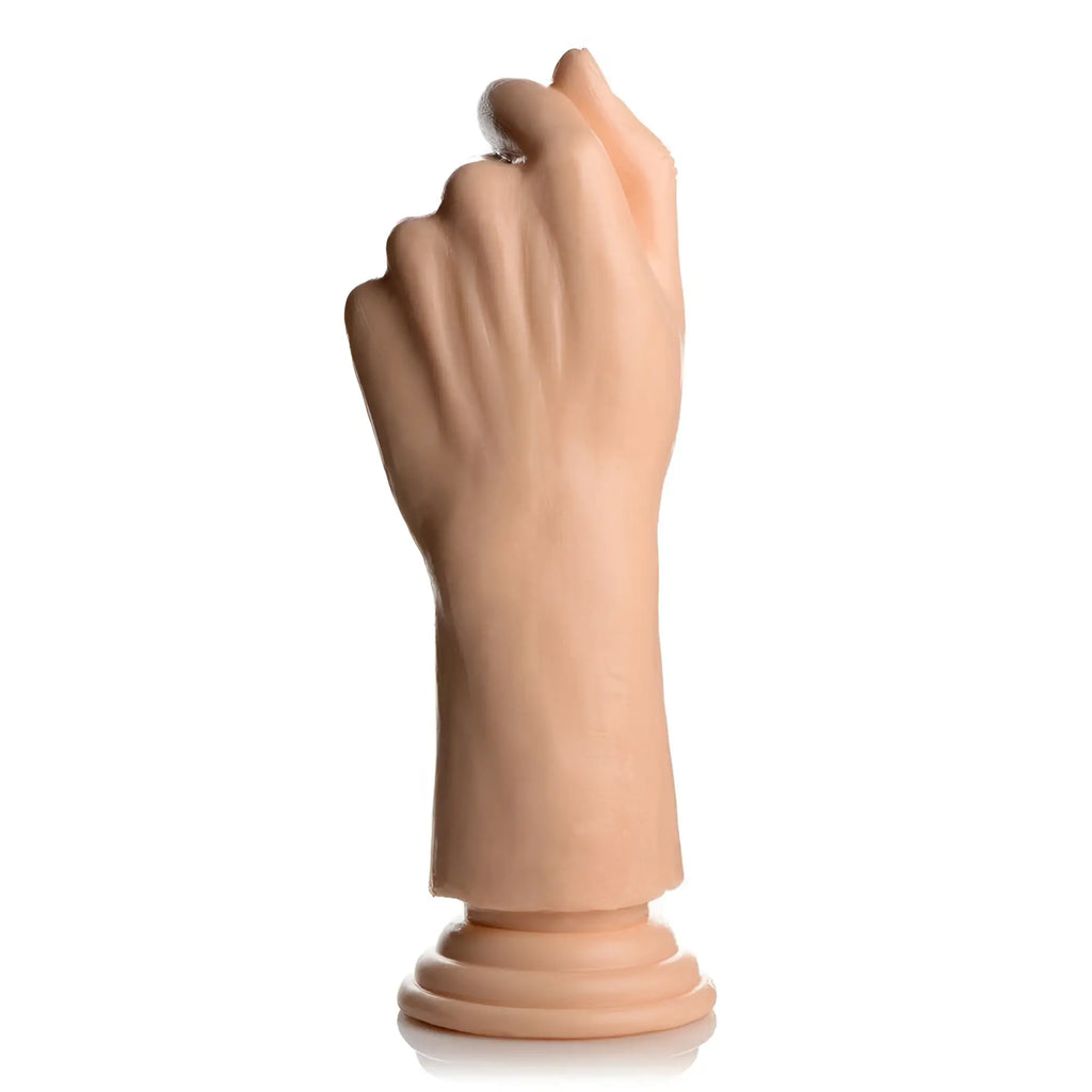 Master Series Knuckles Small: a beige, realistic-style dildo shaped like a clenched fist with a round, flat base.