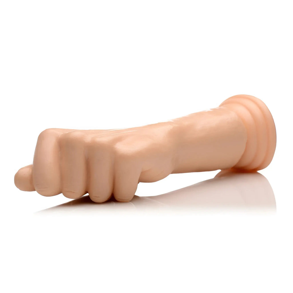 Master Series Knuckles small clenched fist dildo in realistic skin-tone silicone on a white background.