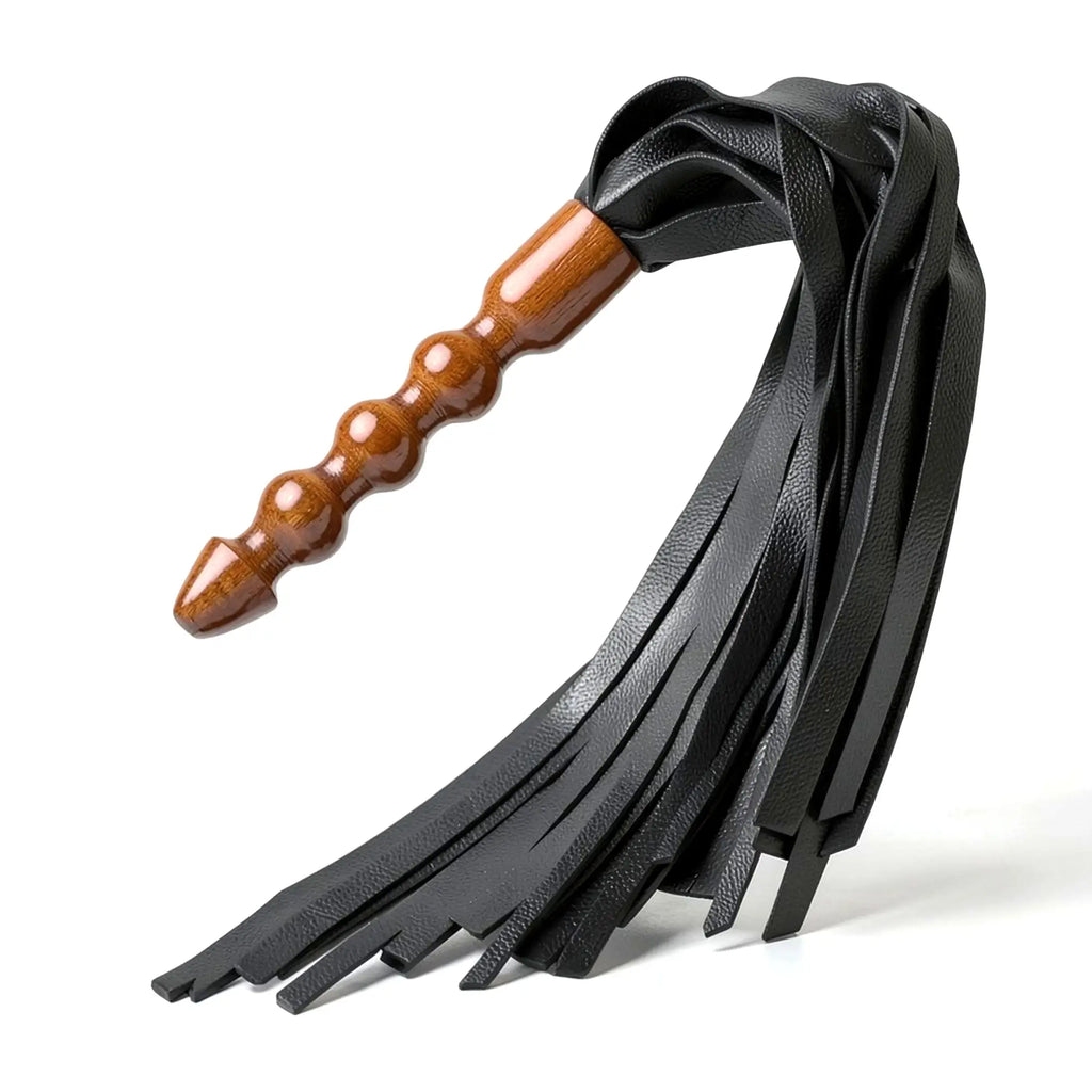 Master Series Lasher Flogger: black leather strips with a textured finish attached to a contoured, stained wooden handle.