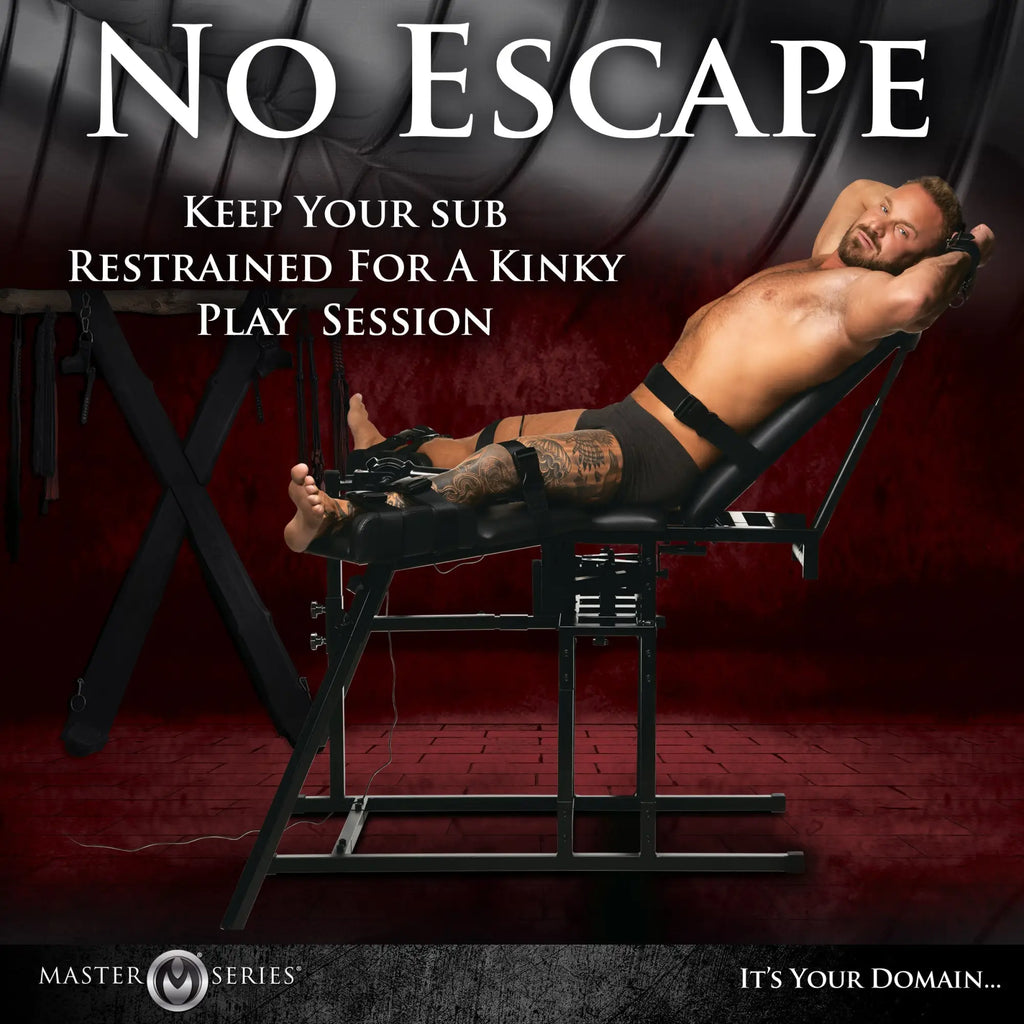 Master Series black metal leg spreader obedience chair with integrated sex machine, featuring a man in restraints.