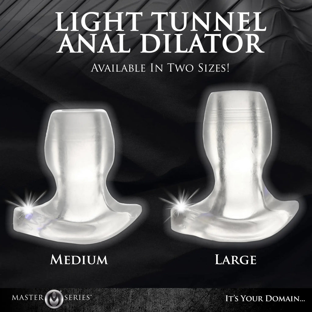 Master Series Light-Tunnel Anal Dilators in clear silicone, shown in medium and large sizes against a black background.