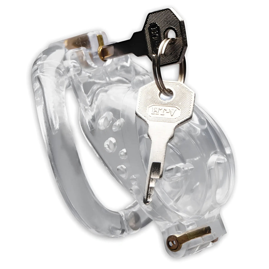 Master Series Lockdown clear acrylic chastity cage with metal locking mechanisms and attached silver keys.