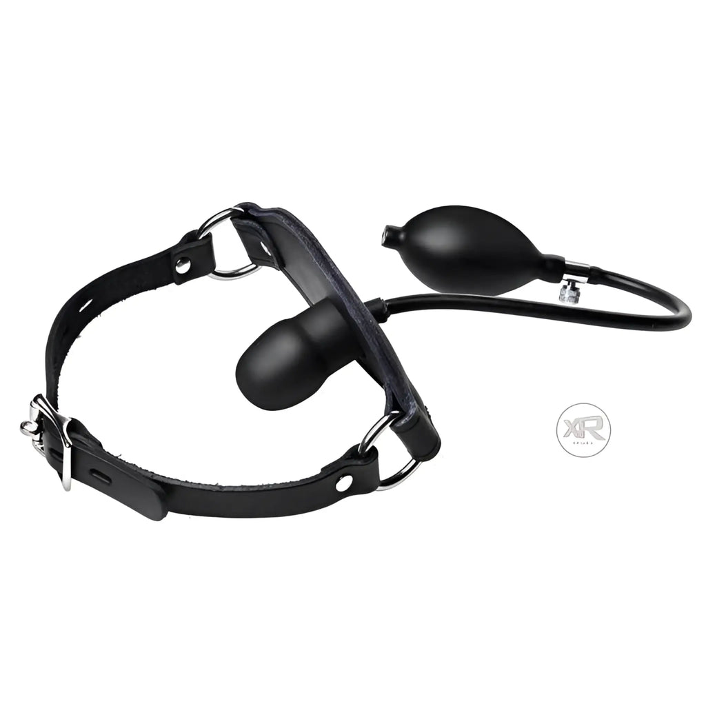 Master Series black leather locking penis pump gag with an inflatable bulb, metal buckles, and adjustable strap.