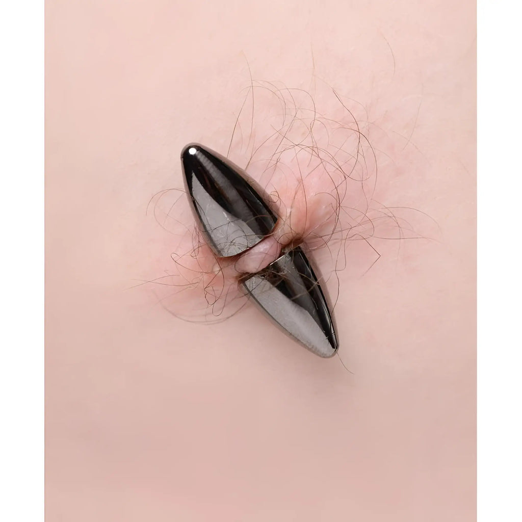 Master Series Mag-Points: Two sleek, shiny black magnetic bullet-style clamps attached to skin.
