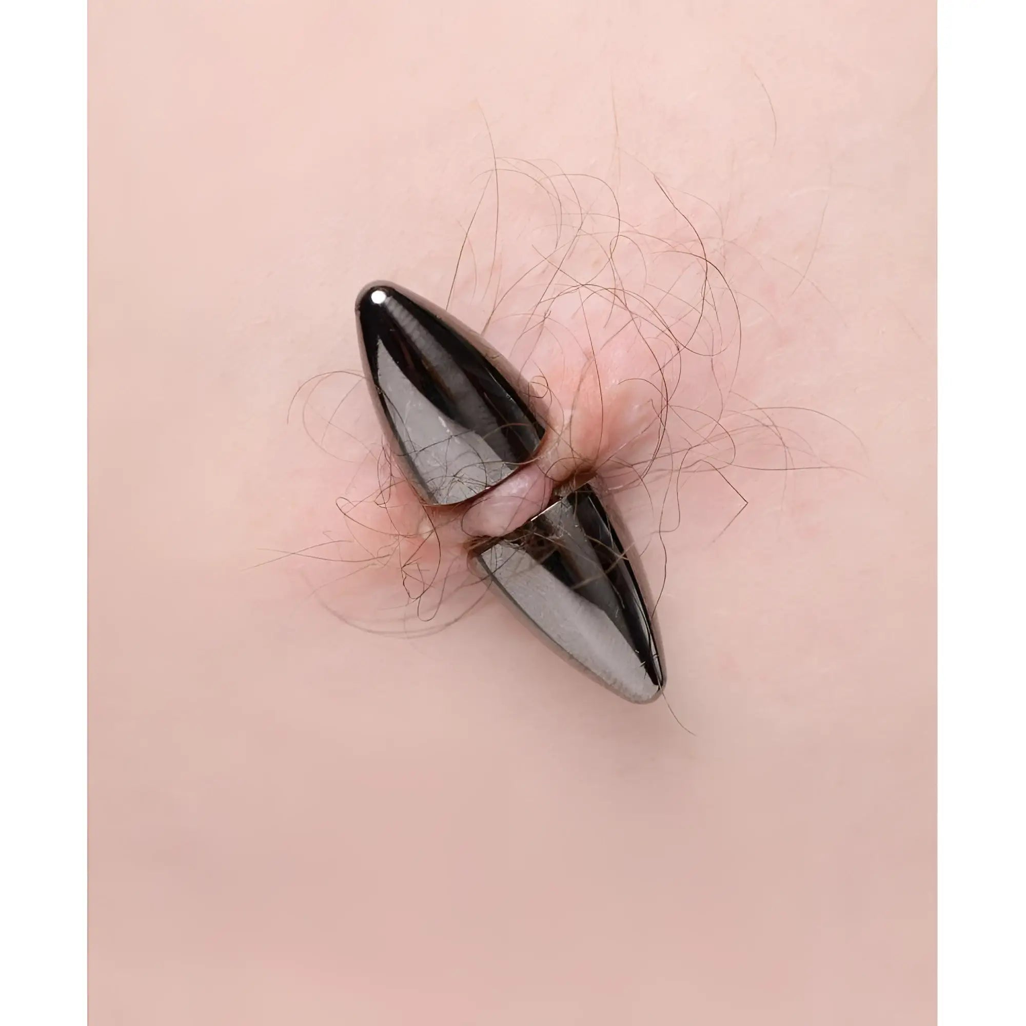 Master Series Mag-Points: Two sleek, shiny black magnetic bullet-style clamps attached to skin.