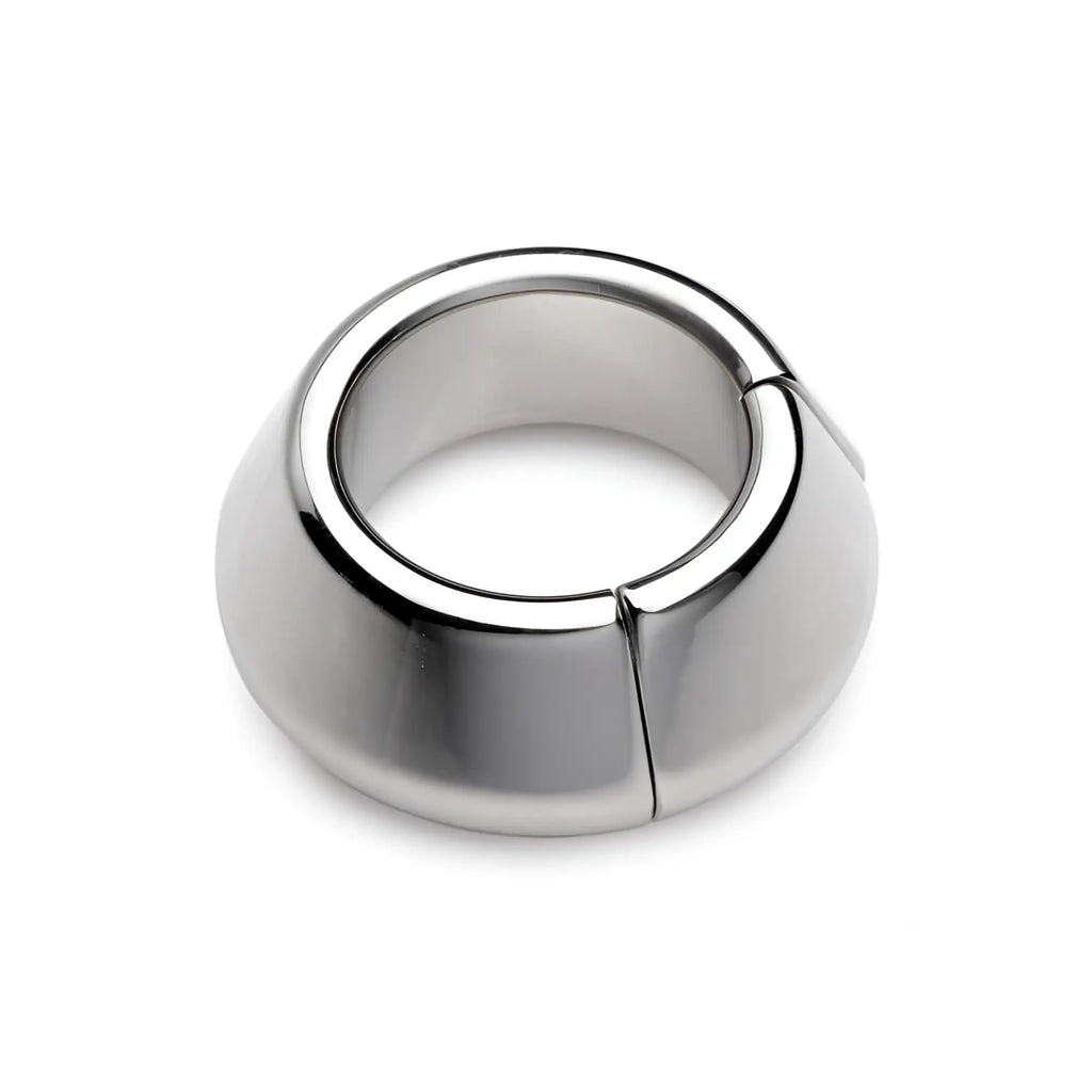 Master Series Magna-Chute magnetic ball stretcher in polished silver metal with a smooth, tapered ring design.