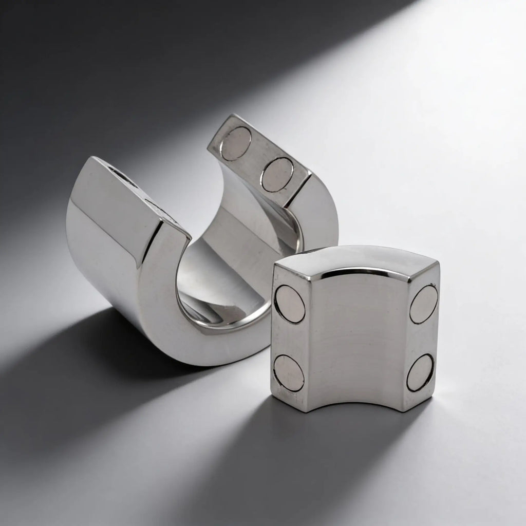 Master Series 30mm magnetic ball stretcher in polished silver stainless steel, shown as two curved, interlocking pieces.