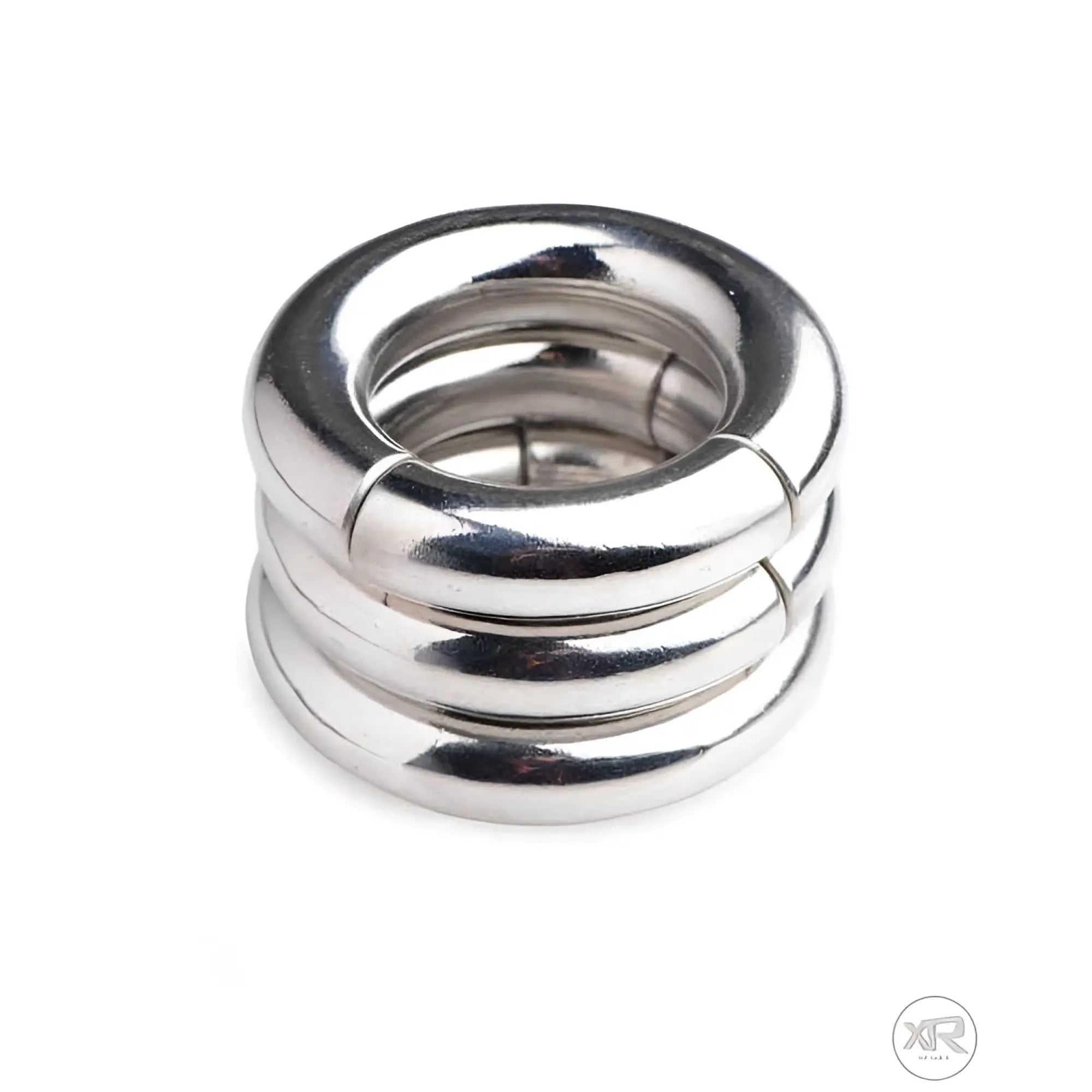 Three stacked, polished silver stainless steel Master Series Magnetize magnetic ball stretcher rings on a white background.