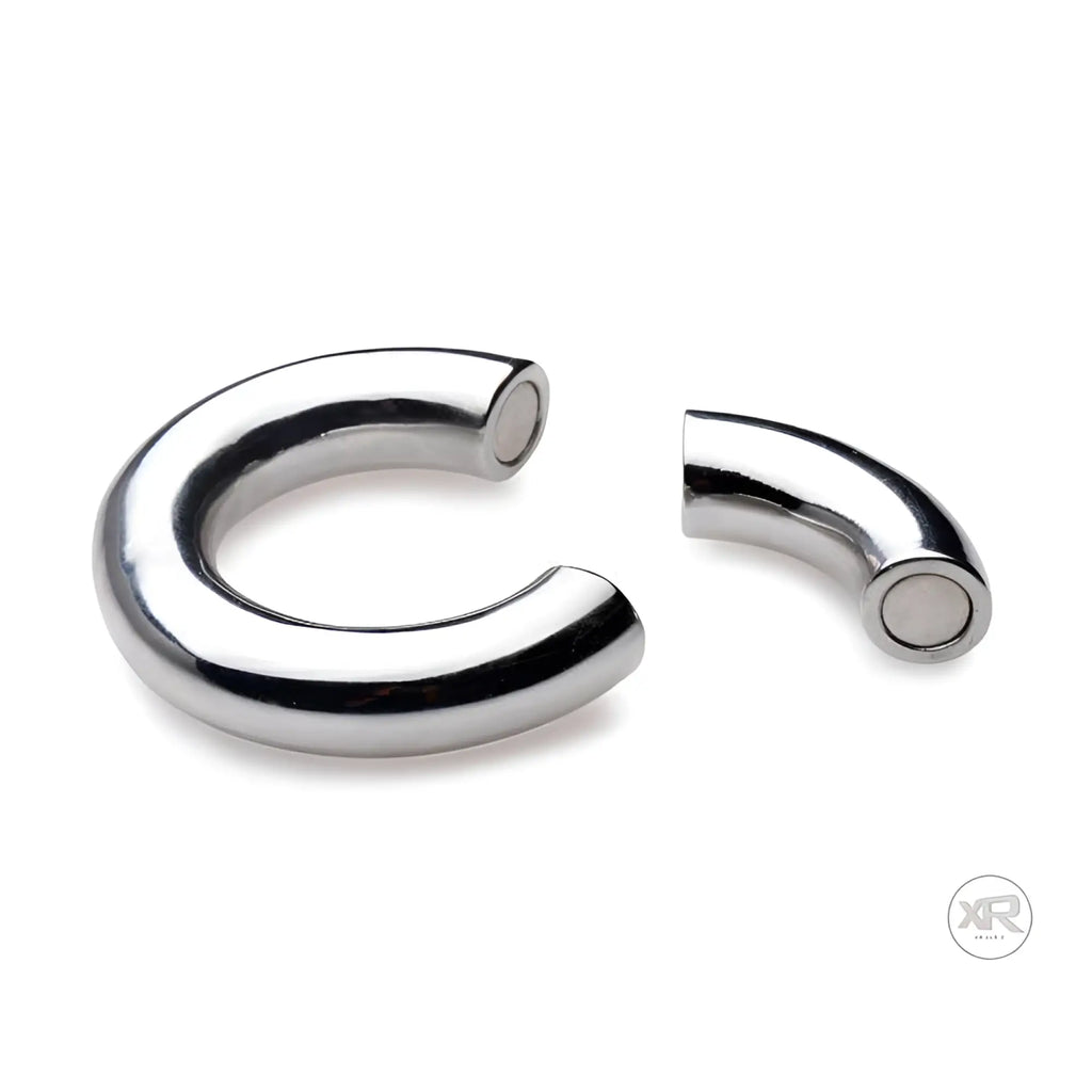 Master Series Magnetize: Silver-toned, stainless steel curved magnetic ball stretcher separated into two pieces.