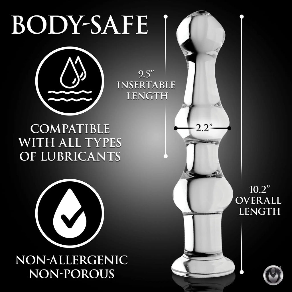 Clear Master Series Mammoth glass dildo with text detailing its dimensions and body-safe features.