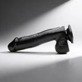 Master Series Mighty Midnight 10-inch dildo in black, featuring a realistic phallic design and a sturdy suction cup base.