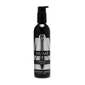 Master Series Numb Desensitizing water-based lubricant in a tall, black pump bottle with a silver, modern patterned label.