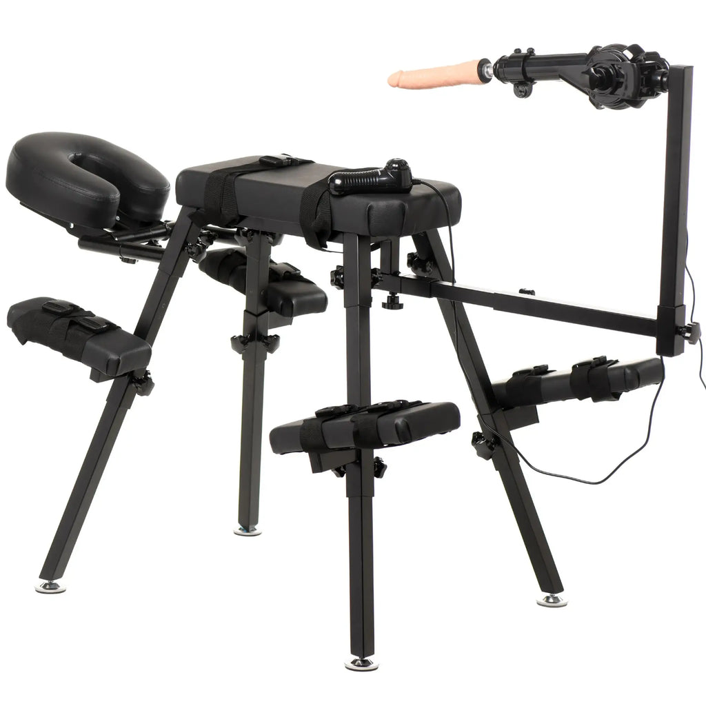 Master Series black metal obedience chair with black padded cushions, adjustable straps, and a mounted sex machine.