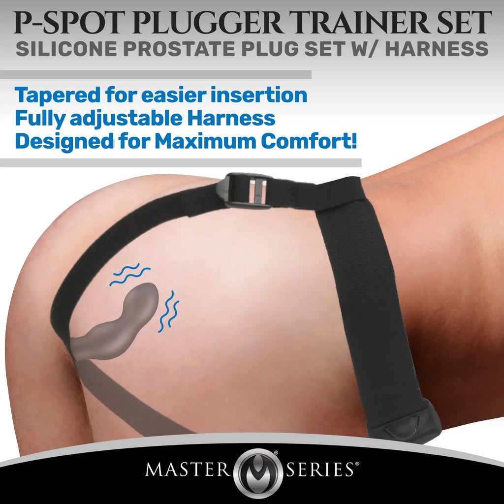 Master Series P-Spot Plugger with a black adjustable harness worn on a person, showing a grey silicone prostate plug.