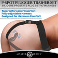 Master Series P-Spot Plugger with a black adjustable harness worn on a person, showing a grey silicone prostate plug.