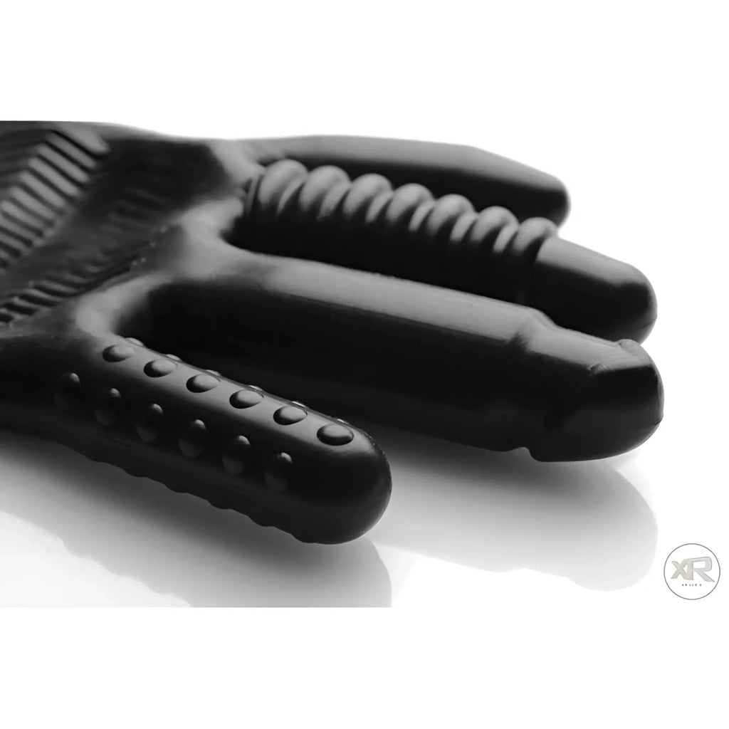 Master Series Pleasure Poker black silicone glove with varying textured, finger-like projections for stimulation.