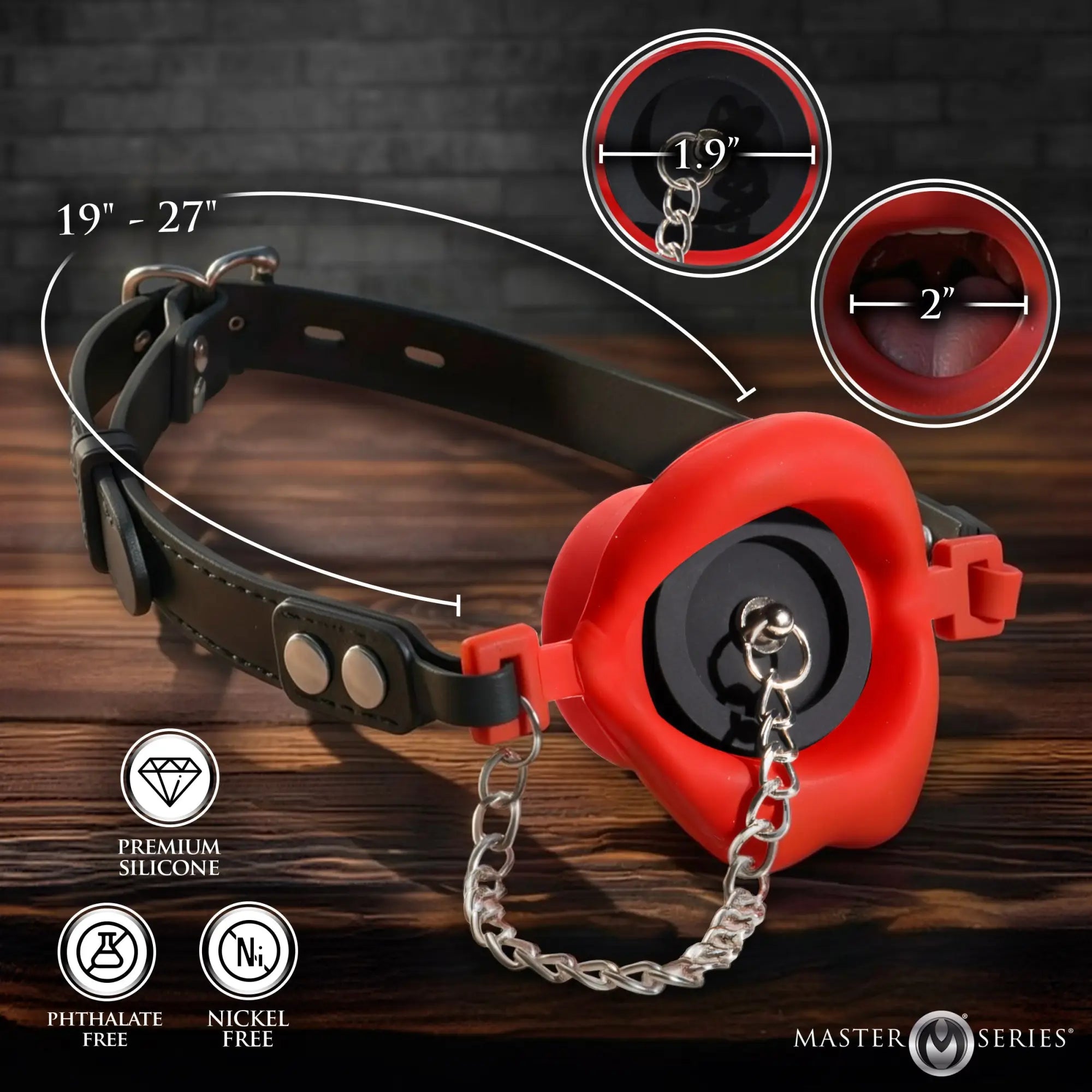 Master Series Plugged Silicone Feeding Gag with adjustable black leather strap, red lip-shaped gag, and metal chain.