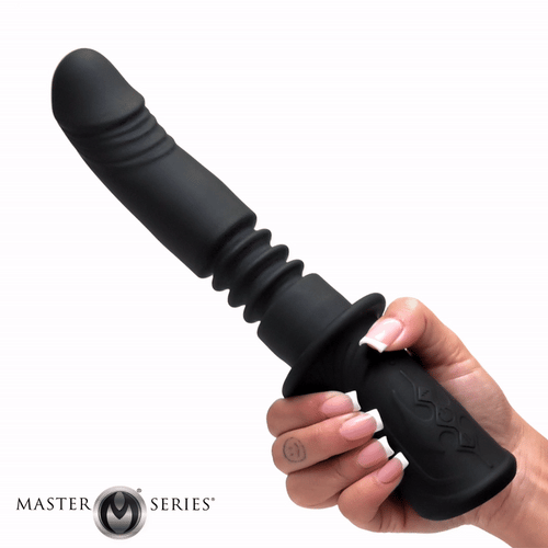 A hand holds a black Master Series Power Thrust silicone vibrator with a ridged shaft and a textured grip.