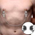 Master Series Primal Spiked Clover Nipple Clamps with chain on chest, showing detail of internal metal spikes.