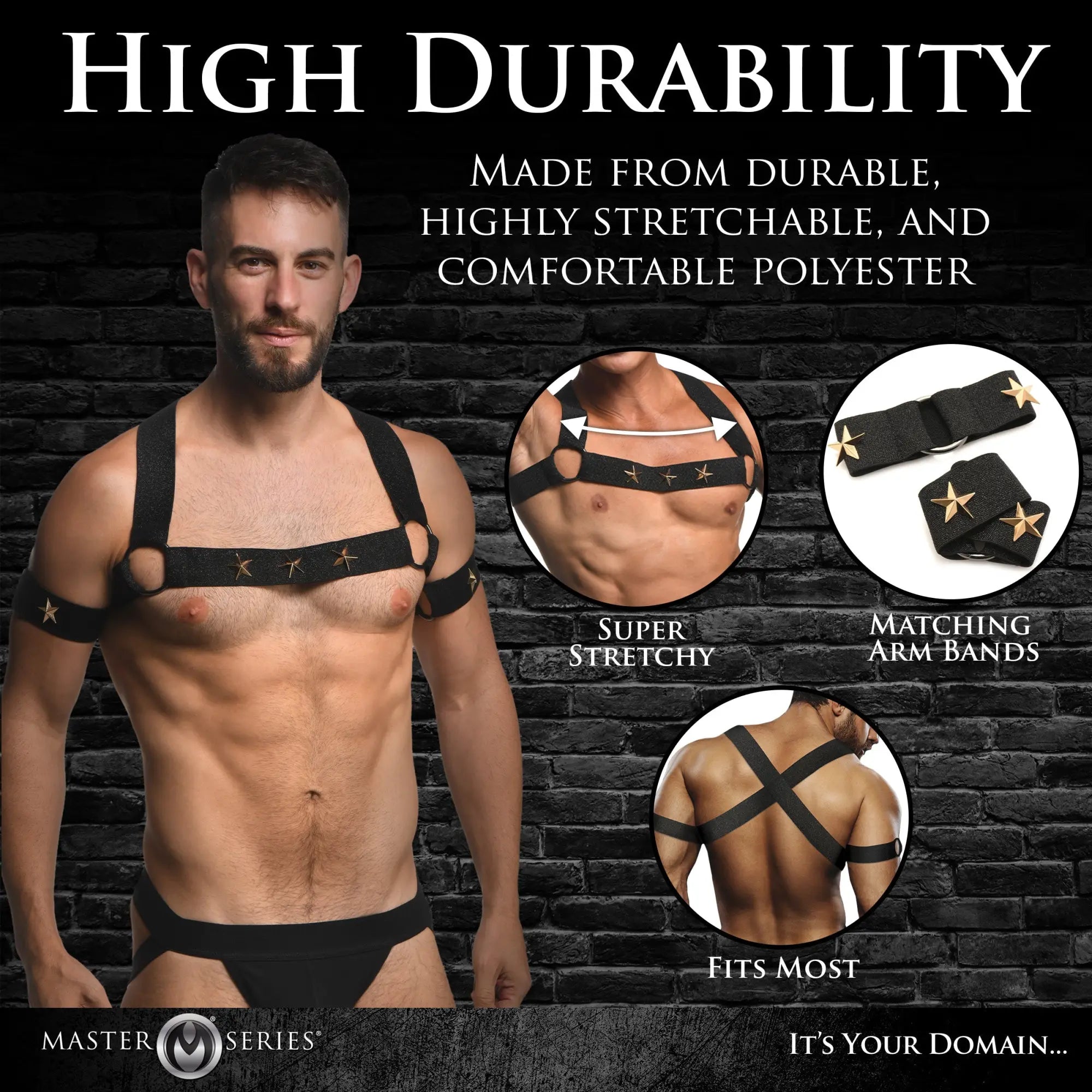 Model wears Master Series Rave black elastic chest harness and matching arm bands with gold star studs on brick wall.